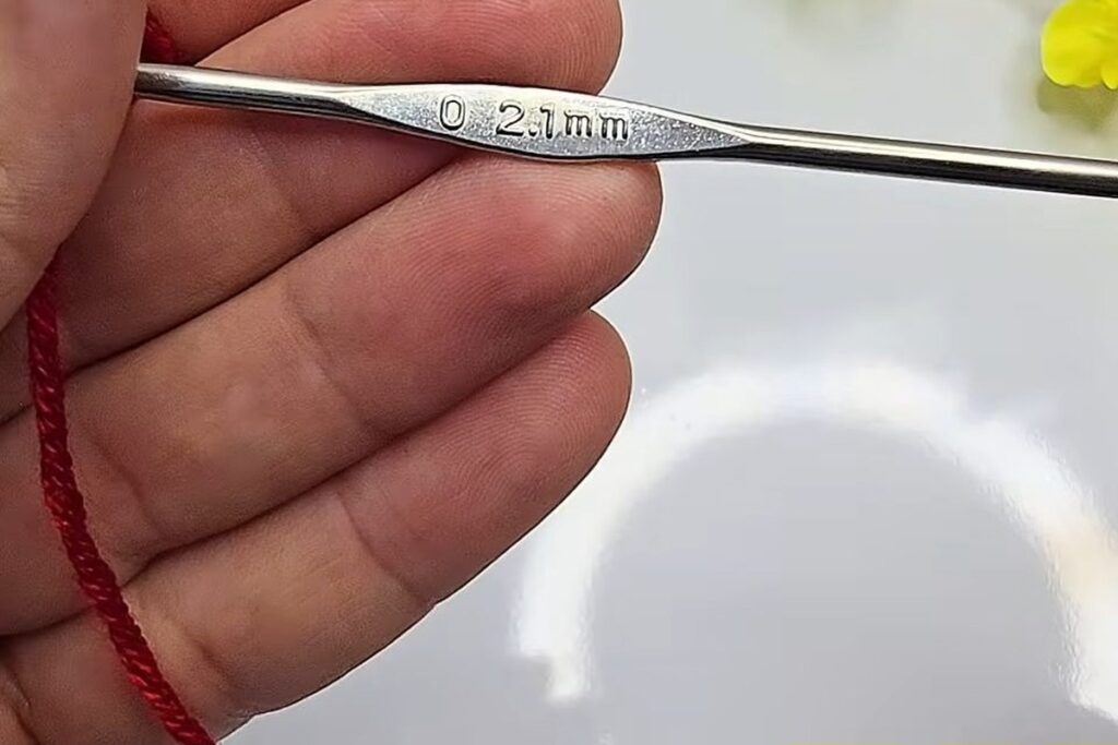 Crochet hook stamped 2.1 mm used for the crochet flower with stem