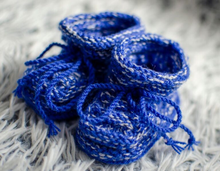 A pair of crocheted baby booties