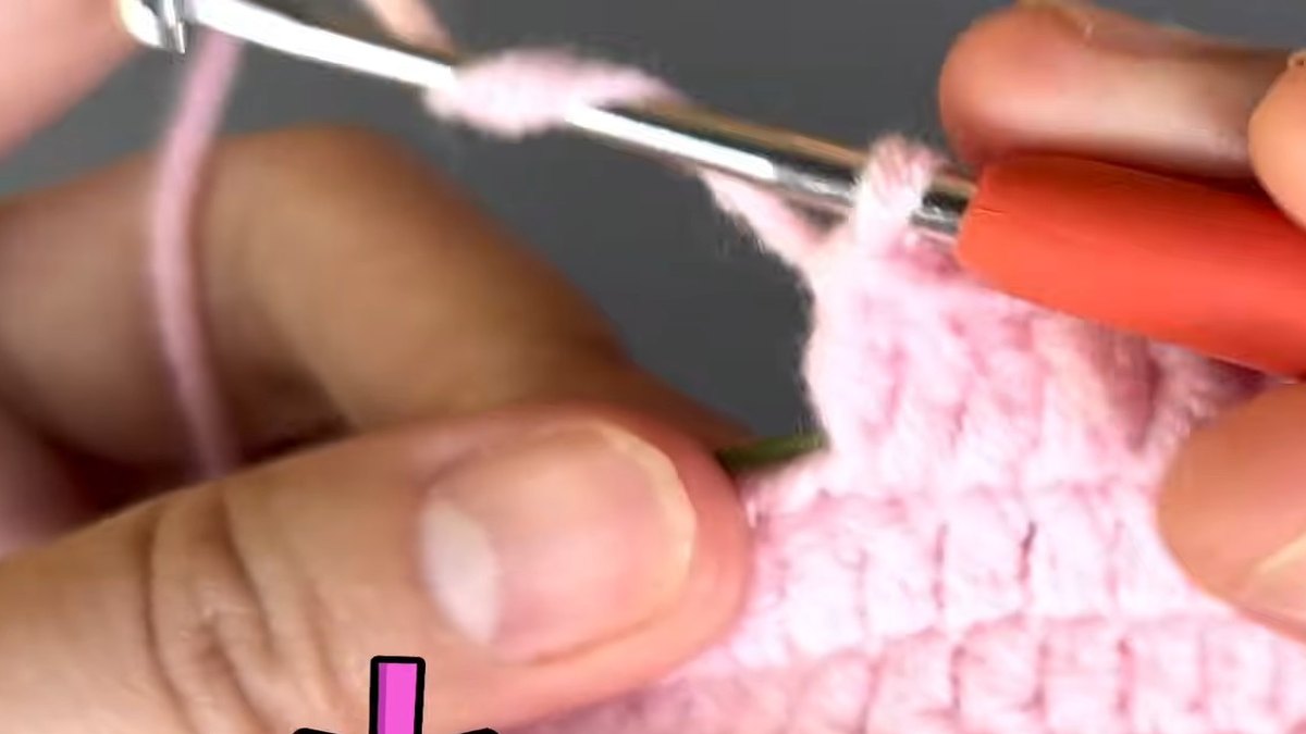 Crochet lily flower petal taking its pointed shape on the hook