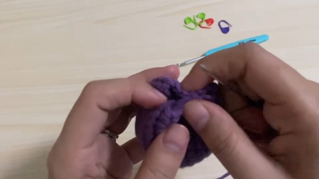 sewing the other ends so the petals cross on a free crochet tulip pattern